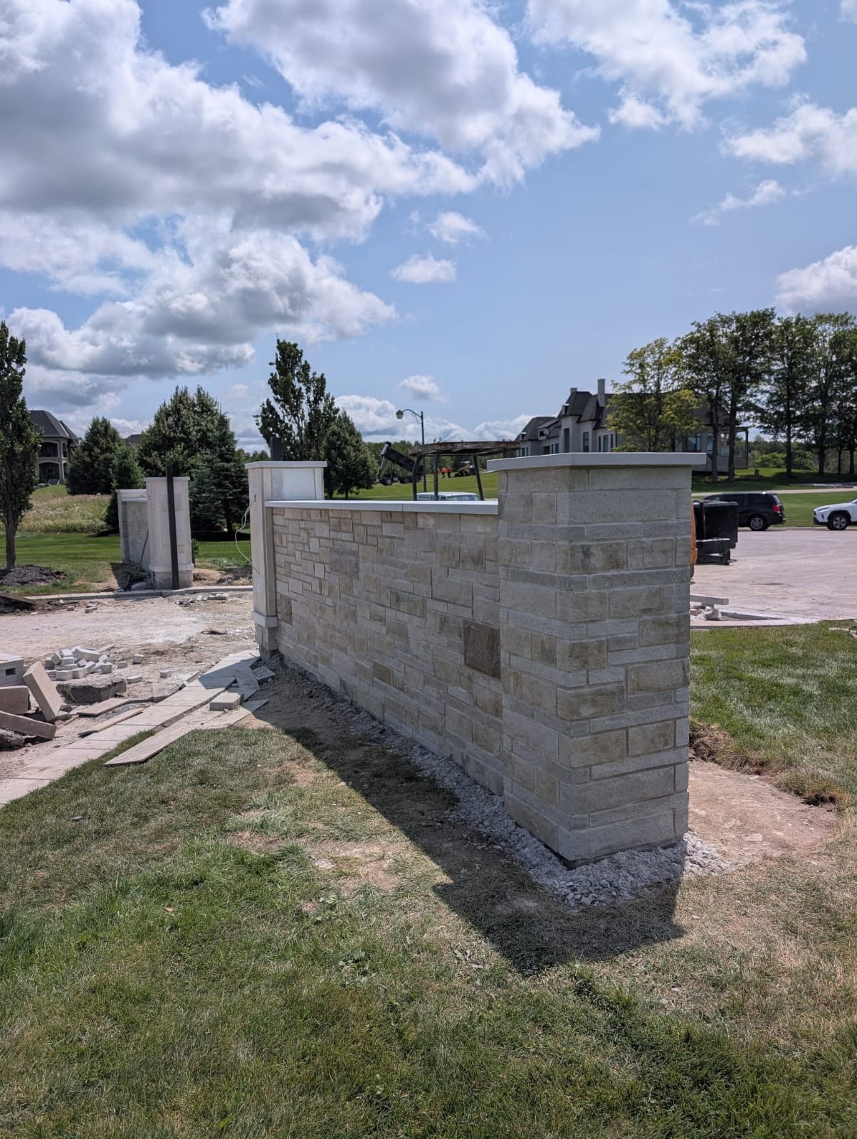 Stone and brick facade installation on residential property